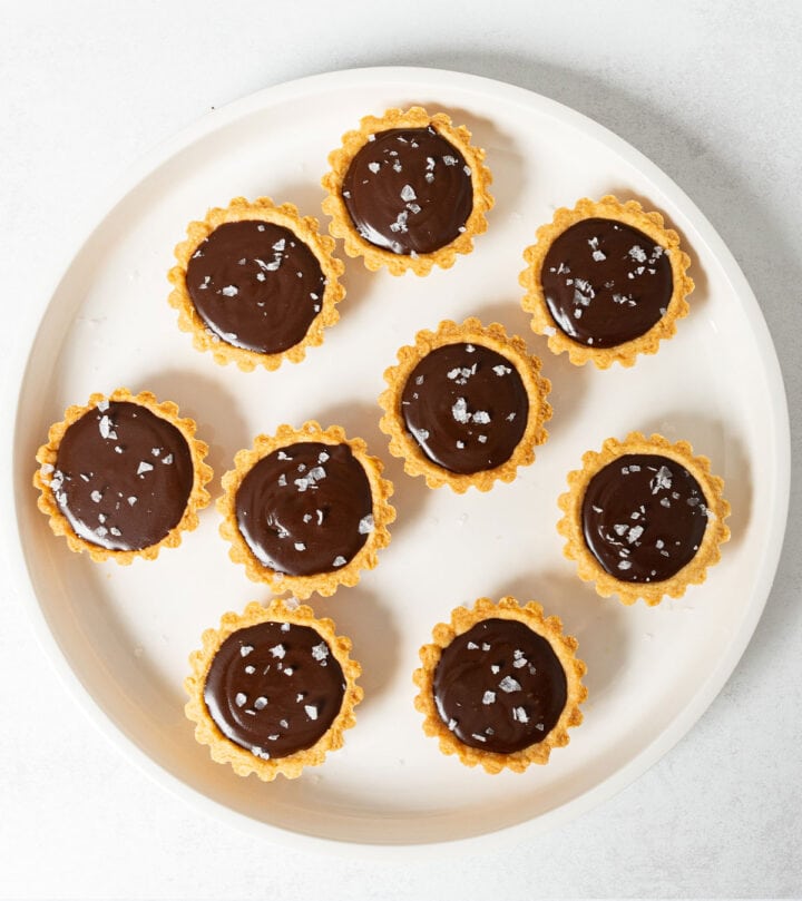 Filling the tart shells.