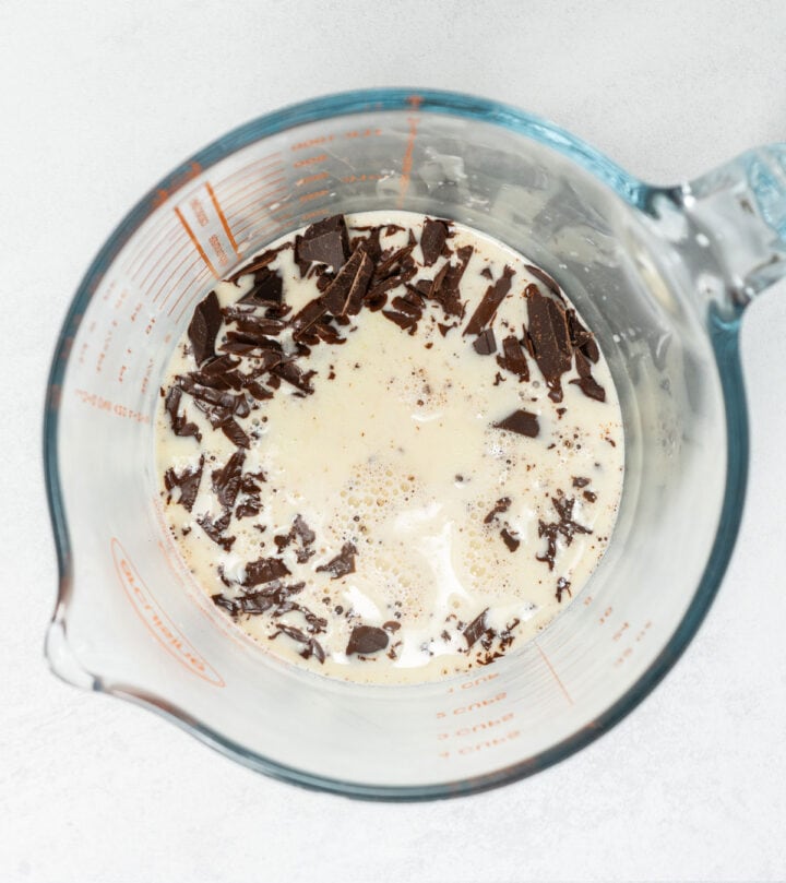 Making chocolate ganache filling.