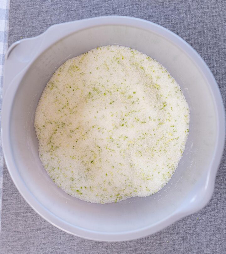 Rubbing sugar with lemon zest.