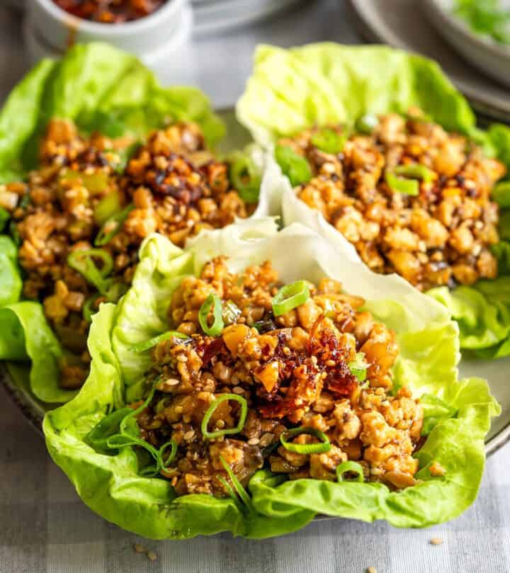 Serving chicken lettuce wraps.