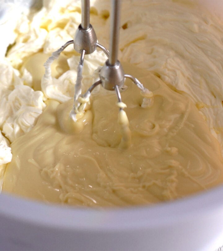 Mixing cream cheese and white chocolate.