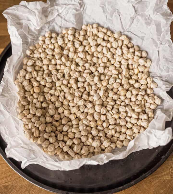 Blind baking the pie with chickpeas.