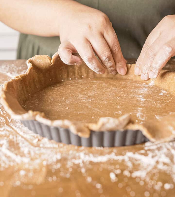 Rolling and shaping the dough.
